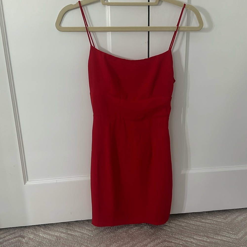 Super cute, unique back, and flattering Superdown dress. Worn once